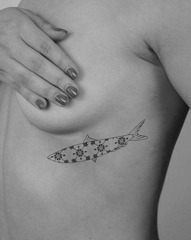 Mockup of tattoo design for Martina with a Portuguese sardinha en azulejos the blue street tiles